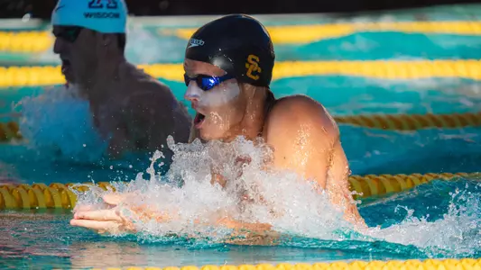 Swimmer Chris O'Grady takes a breath while swimming breaststroke.