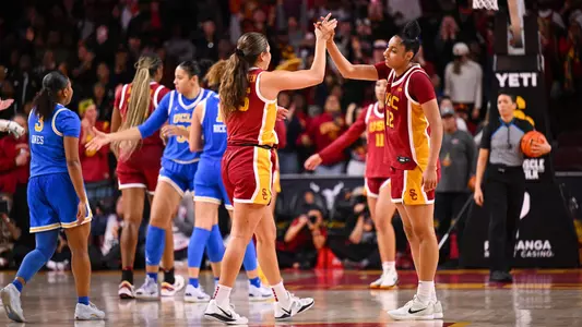 Talia von Oelhoffen and JuJu Watkins give high five during USC's win over UCLA at Galen Center