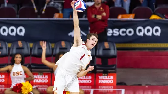 USC men's volleyball junior outside hitter Dillon Klein serves the ball in a match against Princeton at the Galen Center.