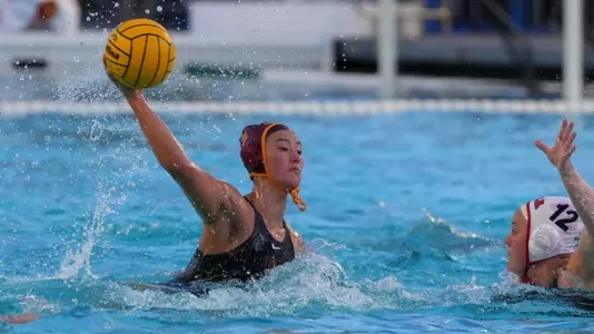 Emily Ausmus takes aim at one of her six goals vs. Biola at Uytengsu Aquatics Center.