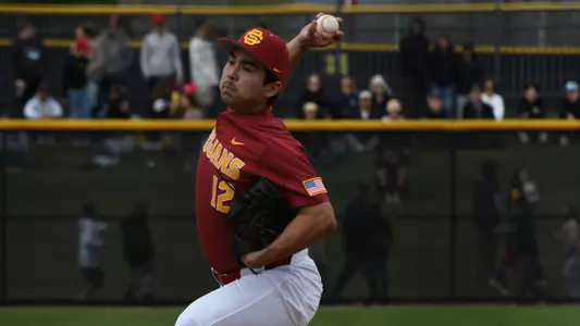 Caden Aoki throws a pitch in the Trojans win over No. 14 Vanderbilt on Saturday.