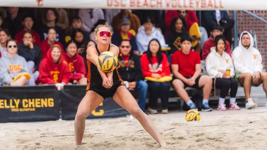 USC beach volleyball junior Delaney Karl passes a serve in a match against Washington at Merle Norman Stadium.
