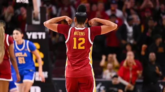 JuJu Watkins flexes after a key play in USC's win over UCLA at Galen Center