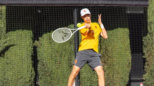 Freshman Matteo Morazzi returns a shot against Purdue at Marks Tennis Stadium