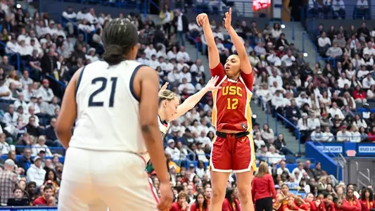 JuJu Watkins shoots over a UConn defender