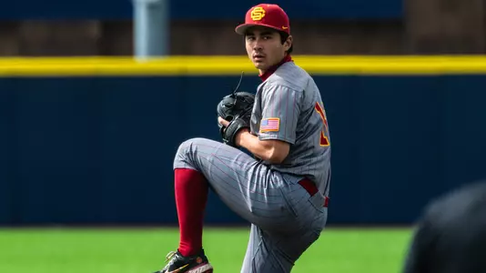 USC right-handed pitcher Caden Aoki prepares to throw a pitch from the mound during the second game of the Michigan series.