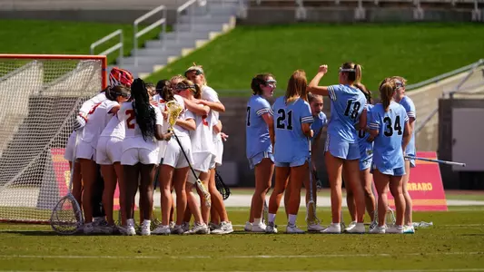 USC and Johns Hopkins Huddle as Teams During the Game on Sunday, Mar. 16