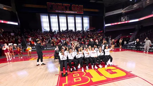 USC players clap and fans cheer as USC is announced as a No. 1 seed for the NCAA Tournament at Galen Center
