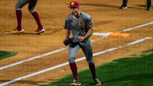 USC left-handed pitcher Sax Matson celebrates with a fierce yell after making a play against Arizona State.