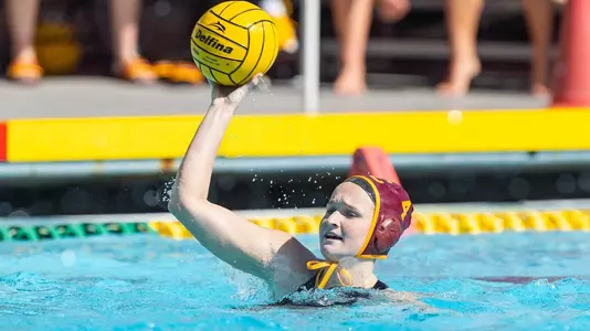 Morgan Netherton passes the ball during a game at Uytengsu Aquatics Center.