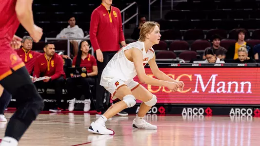 USC men's volleyball freshman libero Johnny Dykstra prepares to pass a serve at Galen Center.