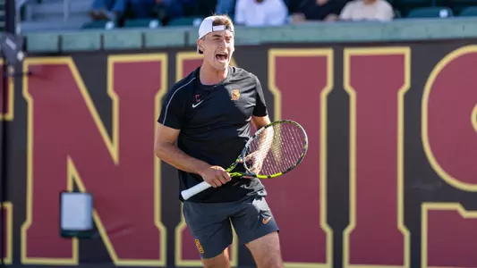 Peter Makk Celebrates as he scores a point against Purdue