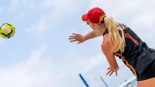 USC beach volleyball sophomore Ashley Pater serves the ball during a match at the FAU Beach Invitational in Pompano Beach, Fla.