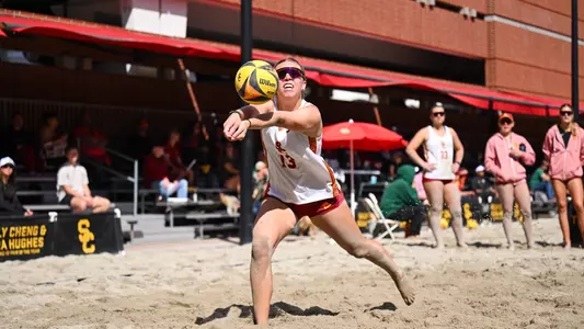 USC beach volleyball graduate Ella Larkin passes the ball during a dual at Merle Norman Stadium.
