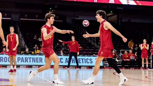 USC men's volleyball freshman outside hitter Christian Connell and sophomore setter Caleb Blanchette share a handshake following a point in a match against Vanguard at Galen Center.