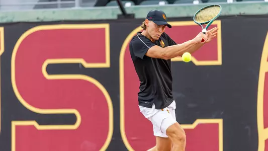 Nathan Trouve Hits Ball Against Washington at Marks Tennis Stadium