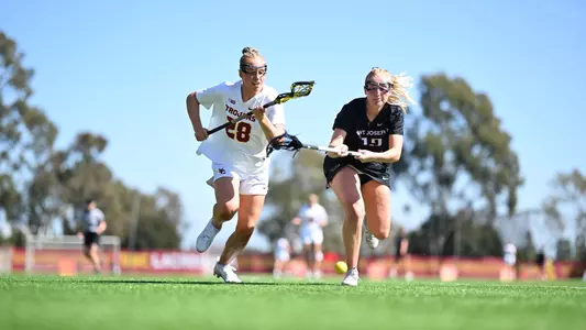 Emma Bunting Goes for Ball against Saint Joseph's