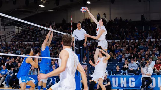 USC men's volleyball freshman middle blocker Parker Tomkinson goes up high to hit a ball during a 3-0 sweep of sixth-ranked BYU at Smith Fieldhouse in Provo, Utah.