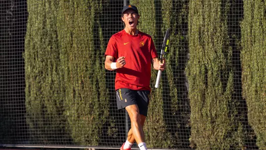 Freshman Connor Church celebrates a set victory over his opponent during the Stanford match