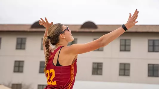 USC beach volleyball graduate Maya Gessner serves the ball in a match against Texas at the Death Volley Invitational in Baton Rouge, La.