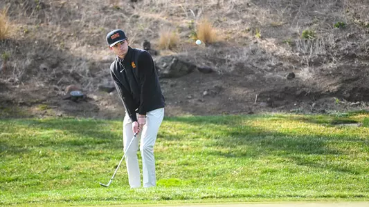 Jack Jerge hits a ball onto the green at the Southwestern Invitational