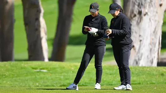 Kylie Chong and Assistant Coach Beth Wu at the tee box at the Palos Verdes G.C.
