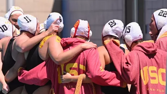 USC players huddle up for a game at UCLA