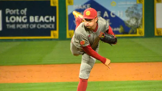Brodie Purcell throws a pitch during the Trojan's game at Long Beach State on Tuesday night.