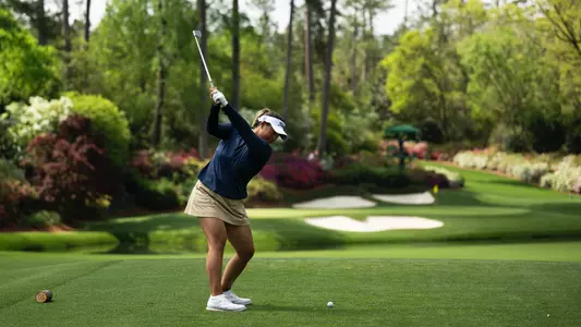 Catherine Park Hits a shot from Amen's Corner at Augusta National Golf Club