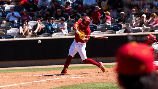 Augie Lopez takes a swing during the Trojans game against Ohio State on Saturday afternoon.