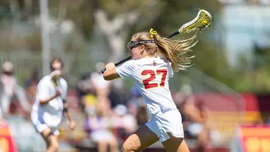 Freshman Kaylee Fravert Charges at the net against Maryland