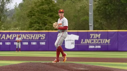 Andrew Johnson throws a pitch during the Trojans Thursday night series opener against Washington at Husky Ballpark.