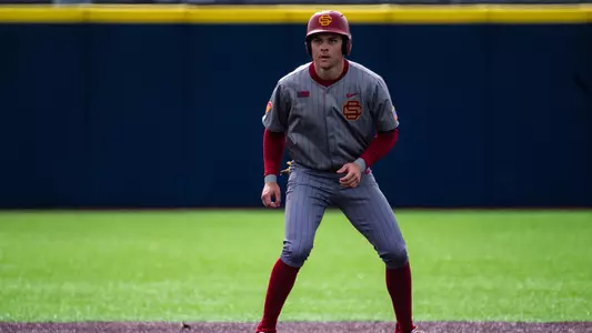 Kade Higgins gets ready to run between first and second base.