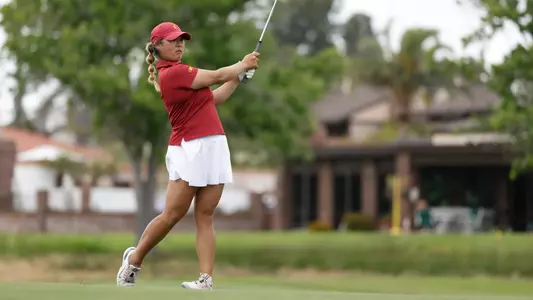 Catherine Park hits the ball from the fairway at the NCAA Championships
