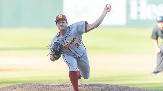 Sax Matson releases a pitch wearing the Trojans' road gray uniforms.