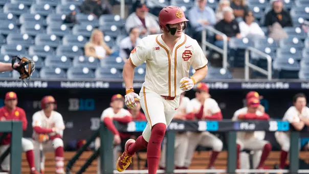 Ethan Hedges runs to first after a base hit in the Trojans game against Washington in the Big Ten Tournament.