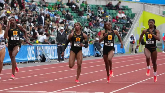 May 18, 2025; Eugene, OR, USA; Madison Whyte of Southern California (left) wins the women's 200m in 22.66 as part of a USC sweep of the top four places during the Big Ten Championships at Hayward Field. From left: Whyte, Samirah Moody, Dajaz Defrand and Jassani Carter. Mandatory Credit: Kirby Lee-Imagn Images