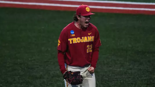 Caden Hunter pumps his fists in celebration after coming in to pitch for the save during USC’s NCAA Regional game against Saint Mary’s.