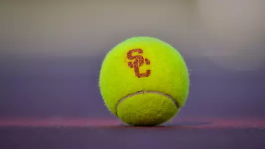 USC tennis ball on court.