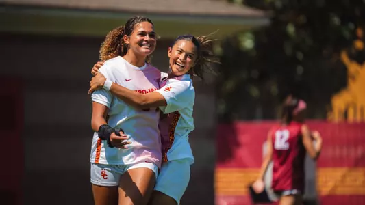 Jaiden Anderson and Maribel Flores celebrate after a goal