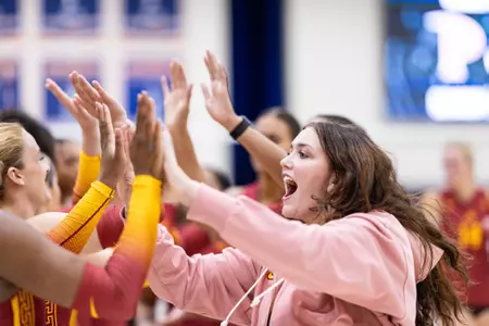 Dani Thomas-Nathan High-Fiving Teammates