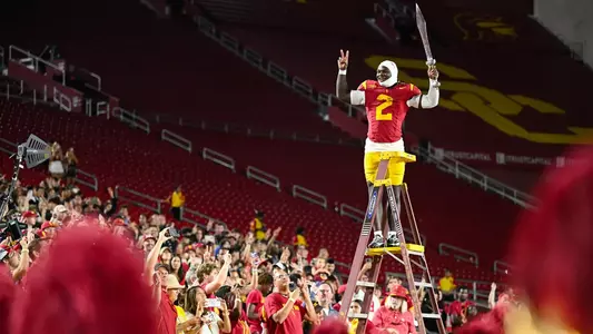 USC Football running back Waymond Jordan leads Trojan Marching Band after win over Georgia Southern Eagles