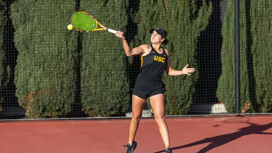 Emma Charney returns a ball with a powerful forehand