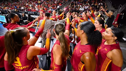 The USC women's volleyball team huddles during a match against Denver at Galen Center.