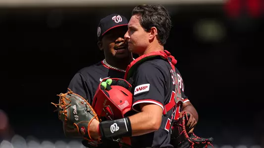 CJ Stubbs is congratulated by a teammate after making his MLB debut with the Washington Nationals.