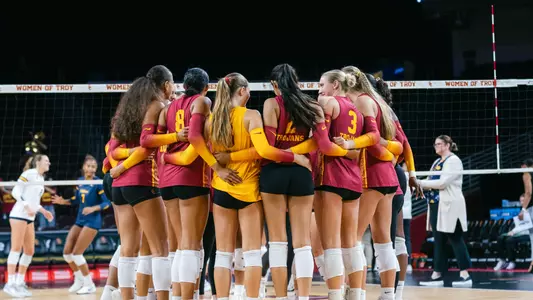 USC women's volleyball gathers to huddle at midcourt before a match against California at the Galen Center