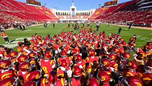 USC Trojans Football team huddles at L.A. Memorial Coliseum