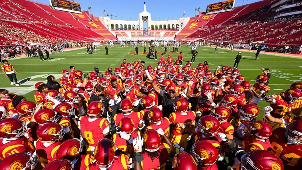 USC Trojans Football team huddles at L.A. Memorial Coliseum