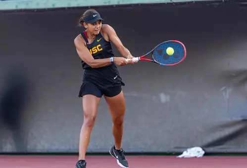 Jana Hossam connects on a return of the tennis ball.