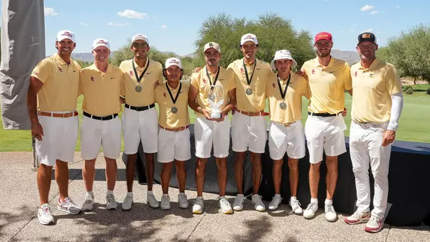 The USC men's golf team poses with the trophy at the Whirlwind Invitational after winning the event.